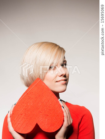 Valentine's Day. Love. Girl holding a heart 15695069