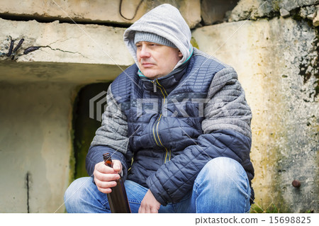 Man with beer bottle at outdoors 15698825