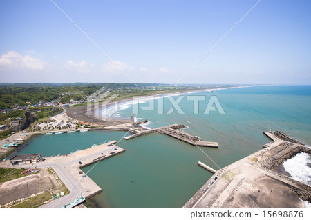 Aerial shooting fishing port and long coastline 15698876