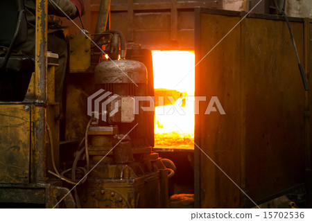 Hard work in a factory 15702536