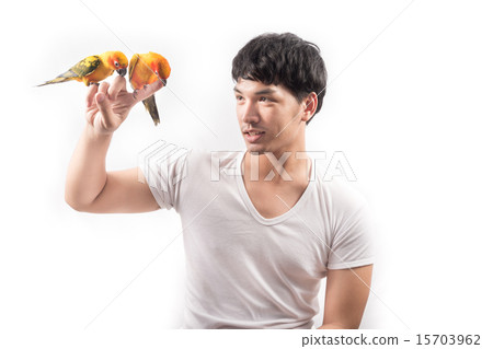 Asian man with sun conure parrot Asian man with sun conure parrot 15703962