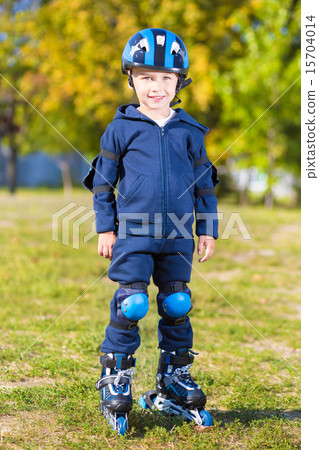 Smiling little skater boy 15704014