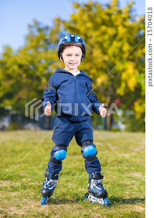 Smiling little skater boy 15704018