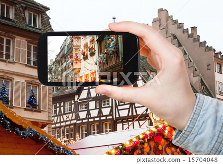 tourist takes photo Christmas decoration tourist takes photo Christmas decoration 15704048