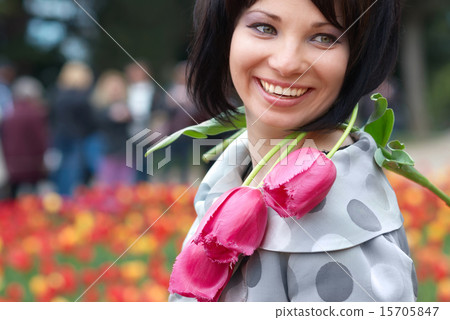 Pretty girl with tulips 15705847