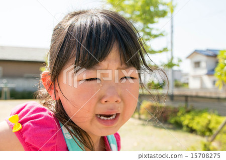 A girl shedding tears 15708275