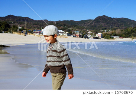Children walking along the beach Children walking along the beach 15708670