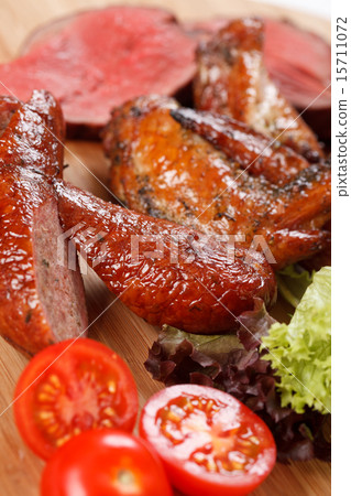 sausages on a wooden cutting board 15711072