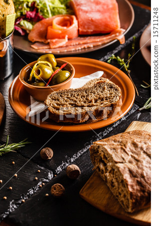 Spanish dinner cooked and served on the table 15711248