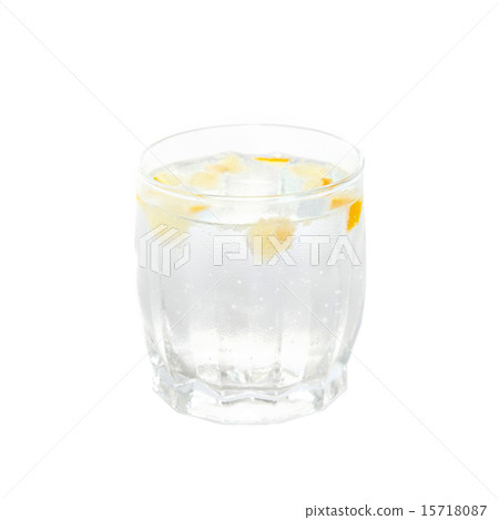A cold water glass with lemon isolated on white. A cold water glass with lemon isolated on white. 15718087