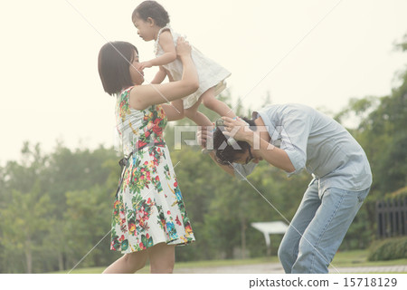 asian family playing and enjoying quality time outdoor asian family playing and enjoying quality time outdoor 15718129