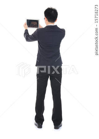 asian business male with tablet 15718273