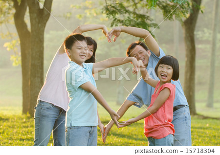Asian Family Enjoying Walk In Summer Countryside Asian Family Enjoying Walk In Summer Countryside 15718304