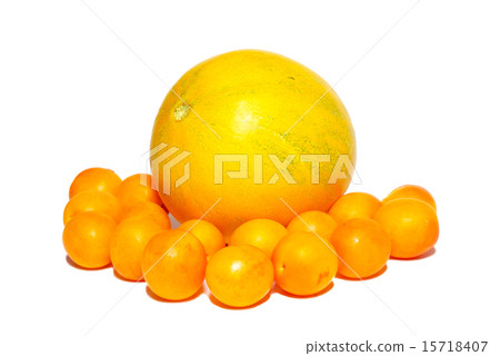 Yellow plums and the melon isolated on white. 15718407
