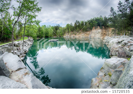 cloudy skies and reflections at a quarry cloudy skies and reflections at a quarry 15720535