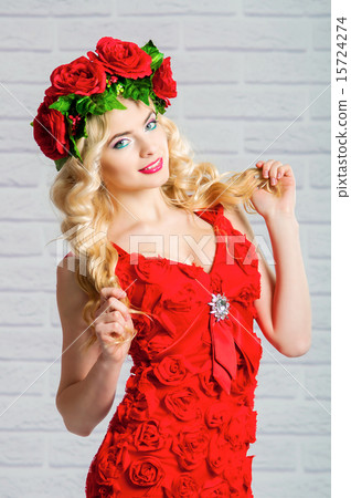 Girl with long hair in a flower wreath in red  15724274