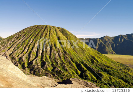 Green active volcano 15725326