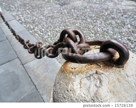 Old rusty anchored Iron Chain 15726139