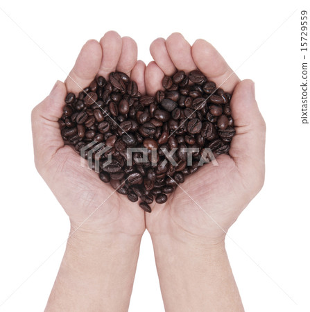 Handful of coffee beans in white isolated 15729559