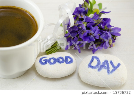 White cup of coffee on a table 15736722