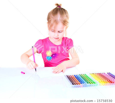 Little Girl Drawing on a White Table. 15738530