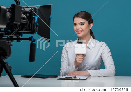 Beautiful girl tv newscaster with pretty smile reports Beautiful girl tv newscaster with pretty smile reports 15739796