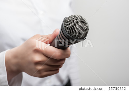 microphone is hold by girl tv journalist 15739832