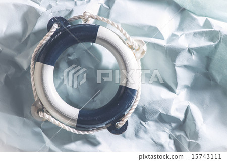 Lifebelt on blue background 15743111