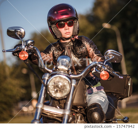 Biker girl on a motorcycle 15747942