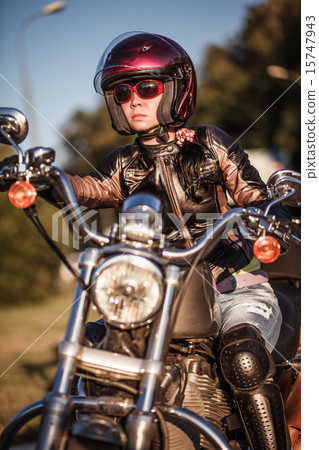Biker girl on a motorcycle 15747943