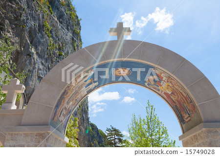 arch decorated with mosaics - entrance to the monastery Ostrog 15749028