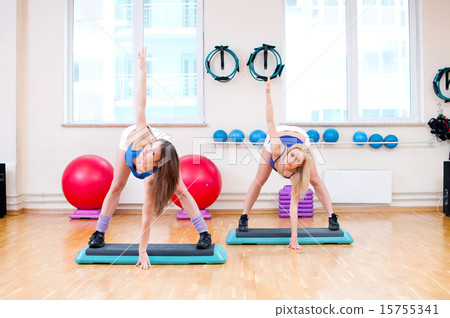 Women do stretching exercise Women do stretching exercise 15755341