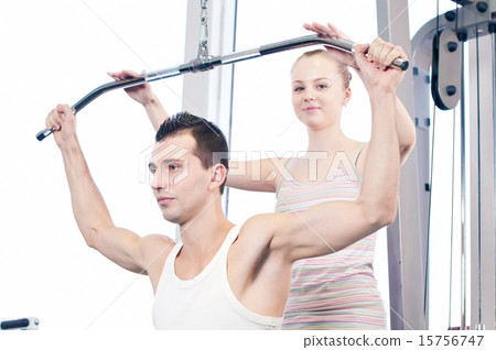 Gym man and woman doing exercise Gym man and woman doing exercise 15756747