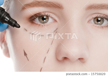 Beautician draw correction lines on woman face 15758820