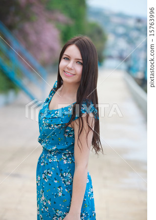 young  happy brunette outdoor shot 15763996