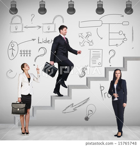 Businessman walking upstairs Businessman walking upstairs 15765748