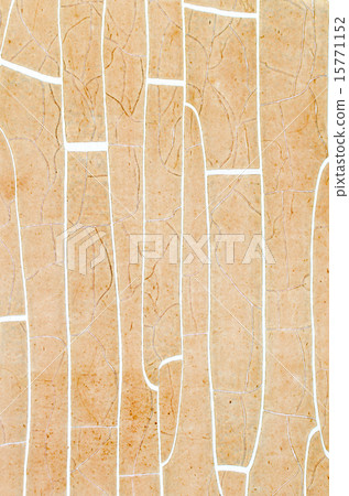 Old cracked dilapidated yellow wall of a building 15771152