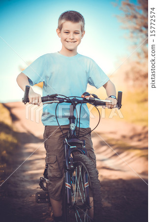 happy funny kid on bicycle. Active Leisure happy funny kid on bicycle. Active Leisure 15772574