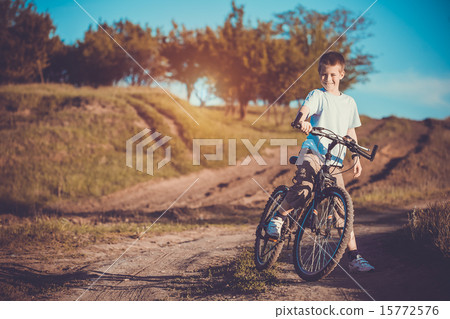 happy funny kid on bicycle. Active Leisure happy funny kid on bicycle. Active Leisure 15772576