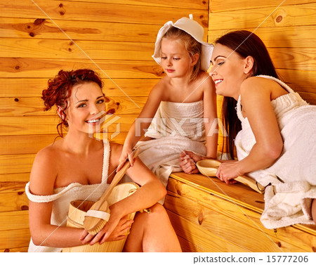Group people with child in sauna. 15777206