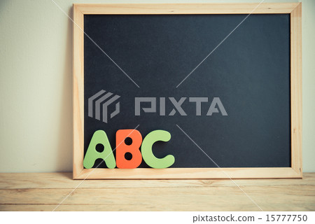 ABC wooden word and black board on the wall 2 15777750