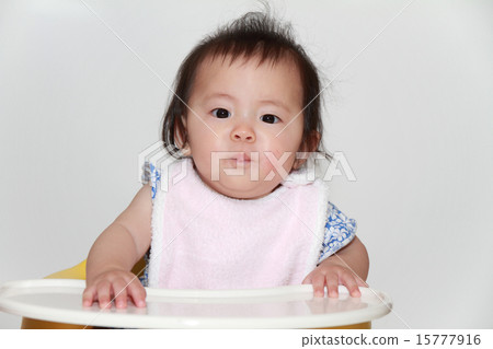 Baby eating baby food (0 year old child) 15777916