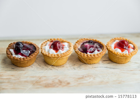 Strawberry and Blueberry tart on wooden floor 15778113