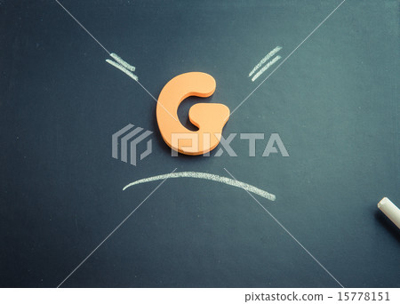 Wooden G charactor on black board 2 15778151