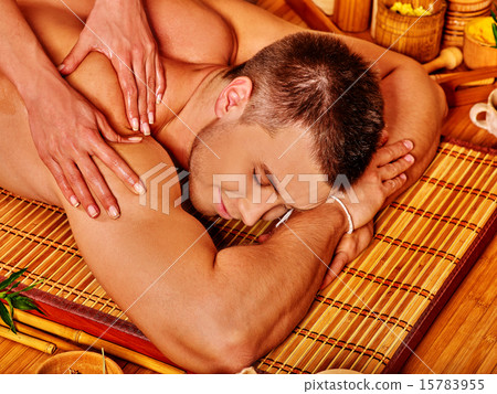 Man getting bamboo massage. 15783955