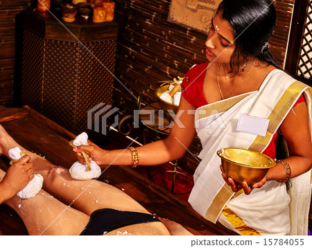 Woman having Ayurvedic feet spa massage. 15784055