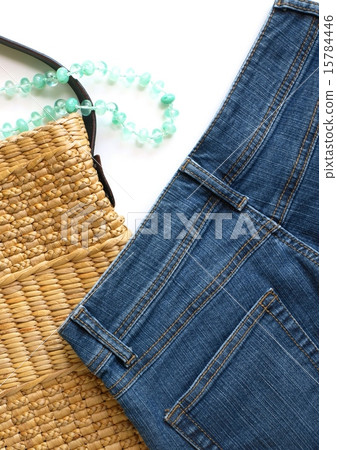 Summer resort fashion, with denim and necklace and natural material bag 15784446