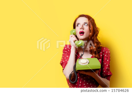 girl in red dress with green dial phone girl in red dress with green dial phone 15784626