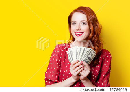 girl in red dress with money 15784629