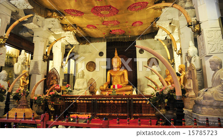 Buddha statues inside the Temple of the Tooth 15785723
